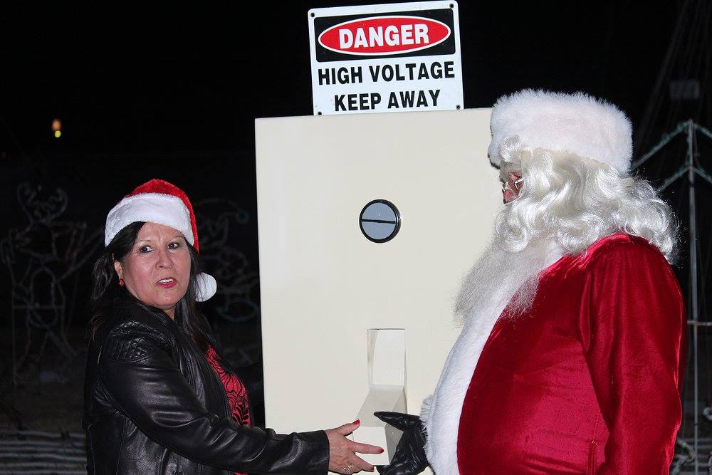 switch.jpg - Our mayor and Santa 'flip' the switch to turn on the lights!