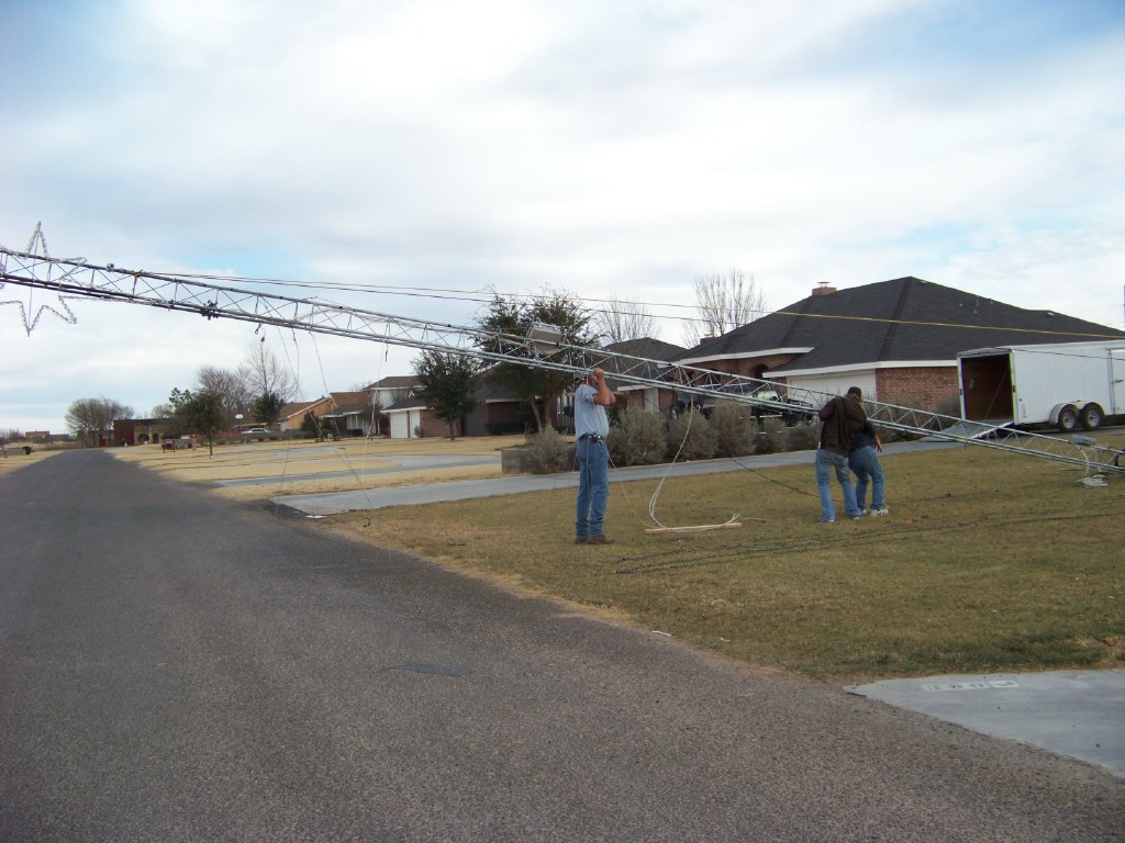 tower2.jpg - Taking down the MegaTree tower after the first year. Having a 'tall' neighbor was handy as I got squished!